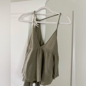 Urban Outfitters flowy tank top. Cropped, slightly longer in the back.Very comfy